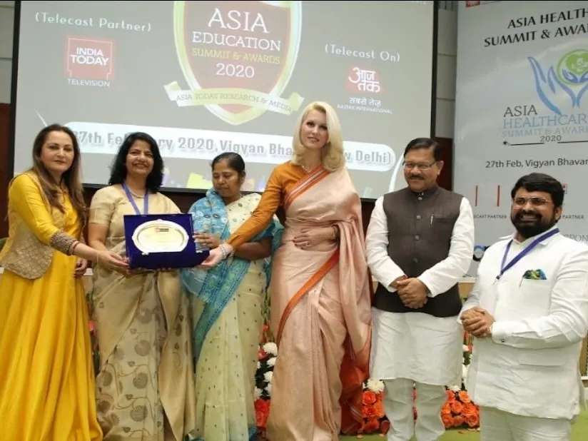 Dr. Anjali receiving another award